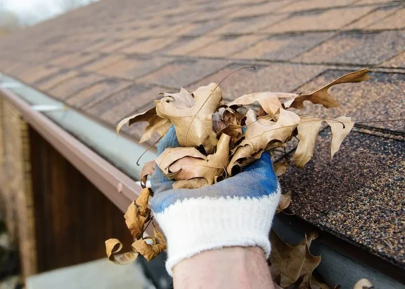 Neatly kept house with clear sight of the gutters that are free of dirt and clutter